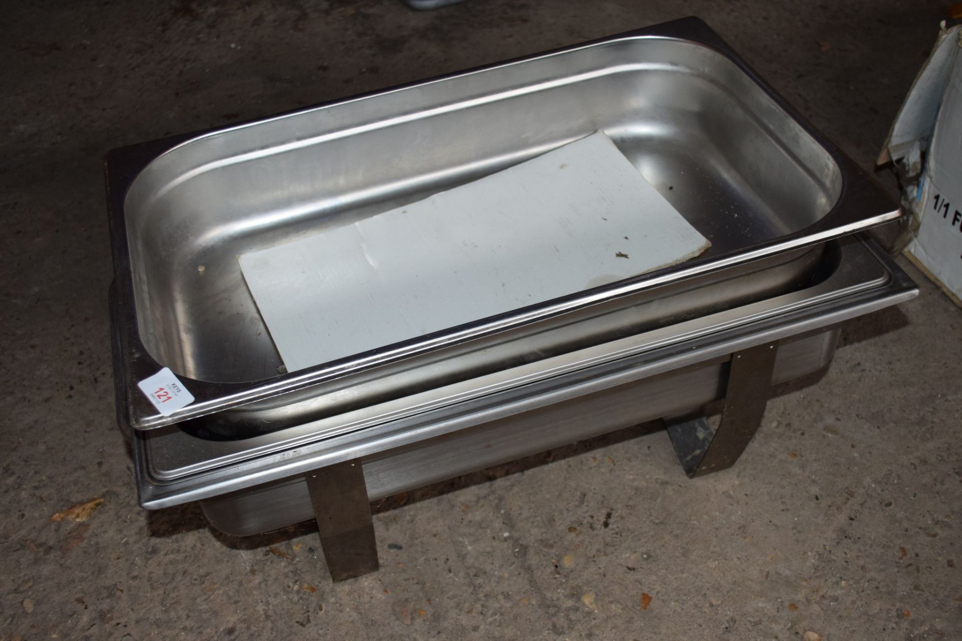 Stainless steel rectangular Chafing Dish and two large stainless steel rectagular Serving Dishes.