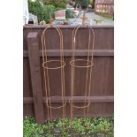PAIR OF LARGE METAL GARDEN OBELISKS, EACH WITH A FLAME SHAPED FINIAL, HEIGHT APPROX 150CM