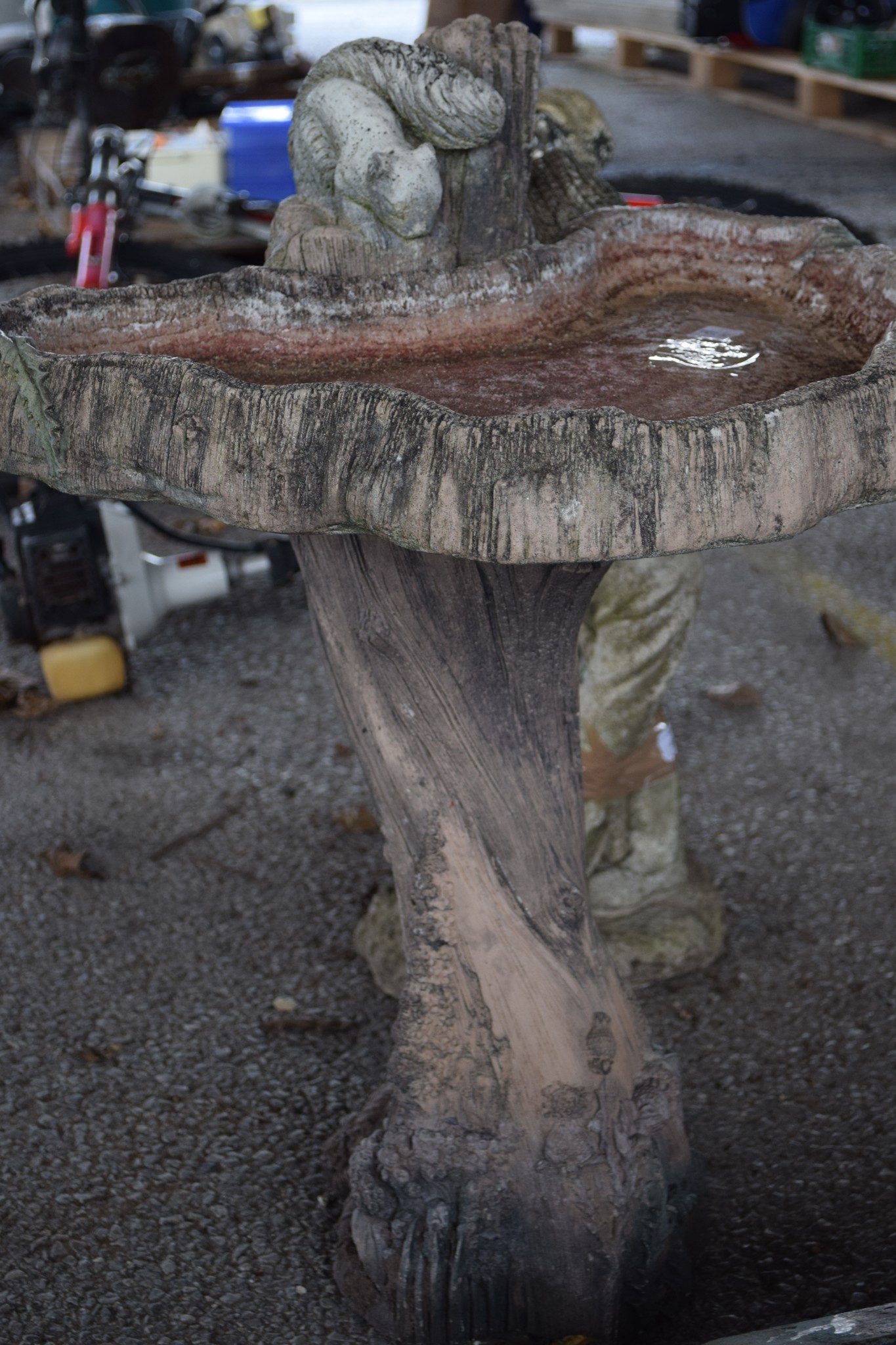 GARDEN BIRD BATH FORMED AS A TREE STUMP MOULDED WITH A SQUIRREL, HEIGHT APPROX 70CM