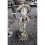COMPOSITE MOULDED GARDEN FIGURE FORMED AS A BOY LEANING ON A SPADE, APPROX 63CM