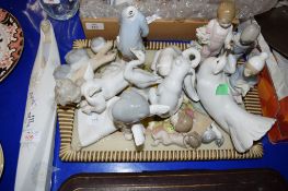 LLADRO PIECES INCLUDING MODELS OF YOUNG GIRLS, AN ANGEL, SWANS AND PIGEONS