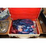 SMALL SUITCASE CONTAINING VARIOUS FABRICS