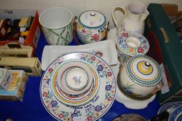 GROUP OF POOLE WARES INCLUDING TWO BISCUIT BARRELS WITH WICKER HANDLES