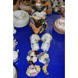 CERAMICS INCLUDING VASES AND FLOWERS BY ROYAL STAFFORD AND A ROYAL DOULTON TOBY JUG OF ROBIN HOOD