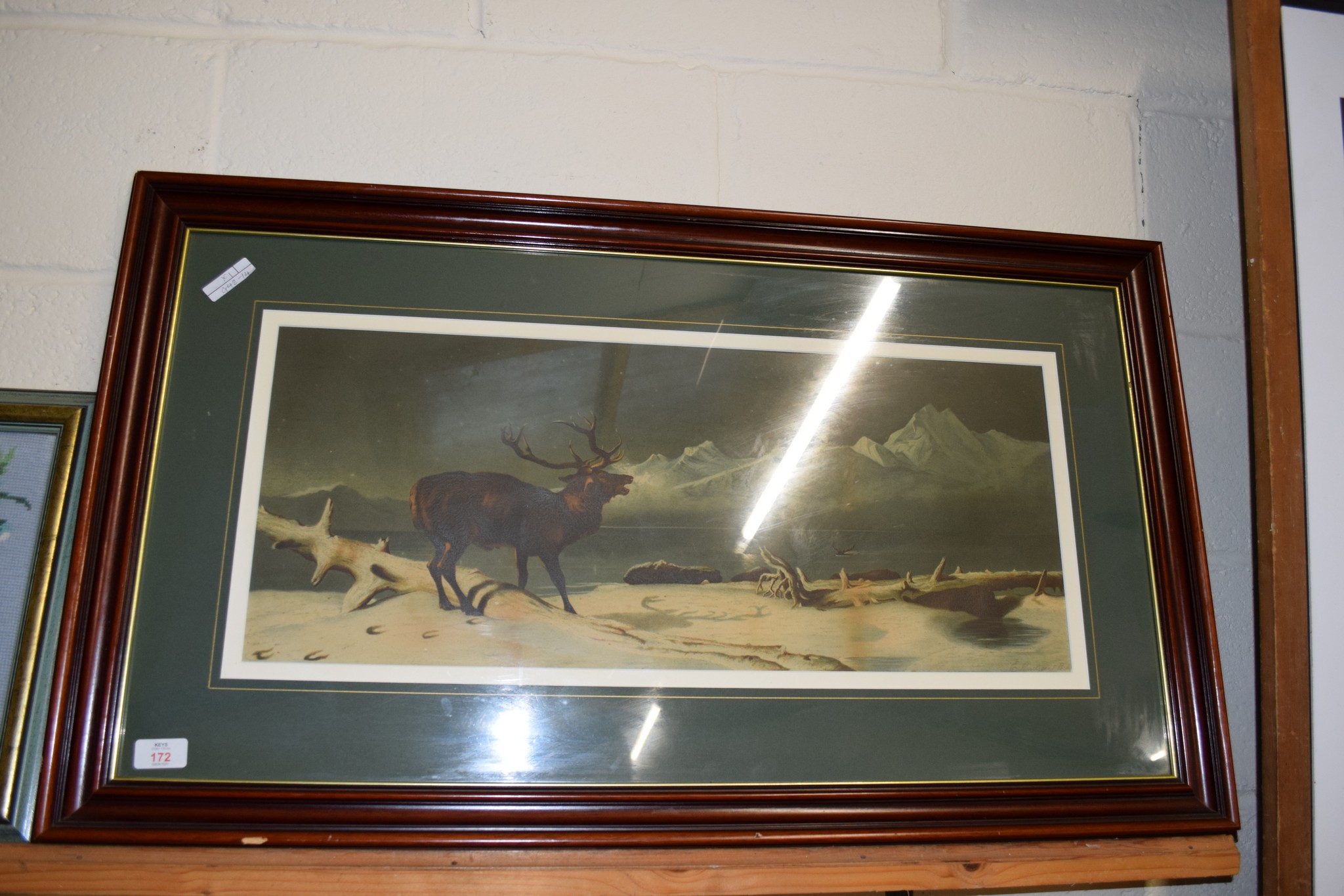 LARGE VICTORIAN LANDSEER CHROMOLITHOGRAPH OF A STAG IN A MOUNTAINOUS LANDSCAPE