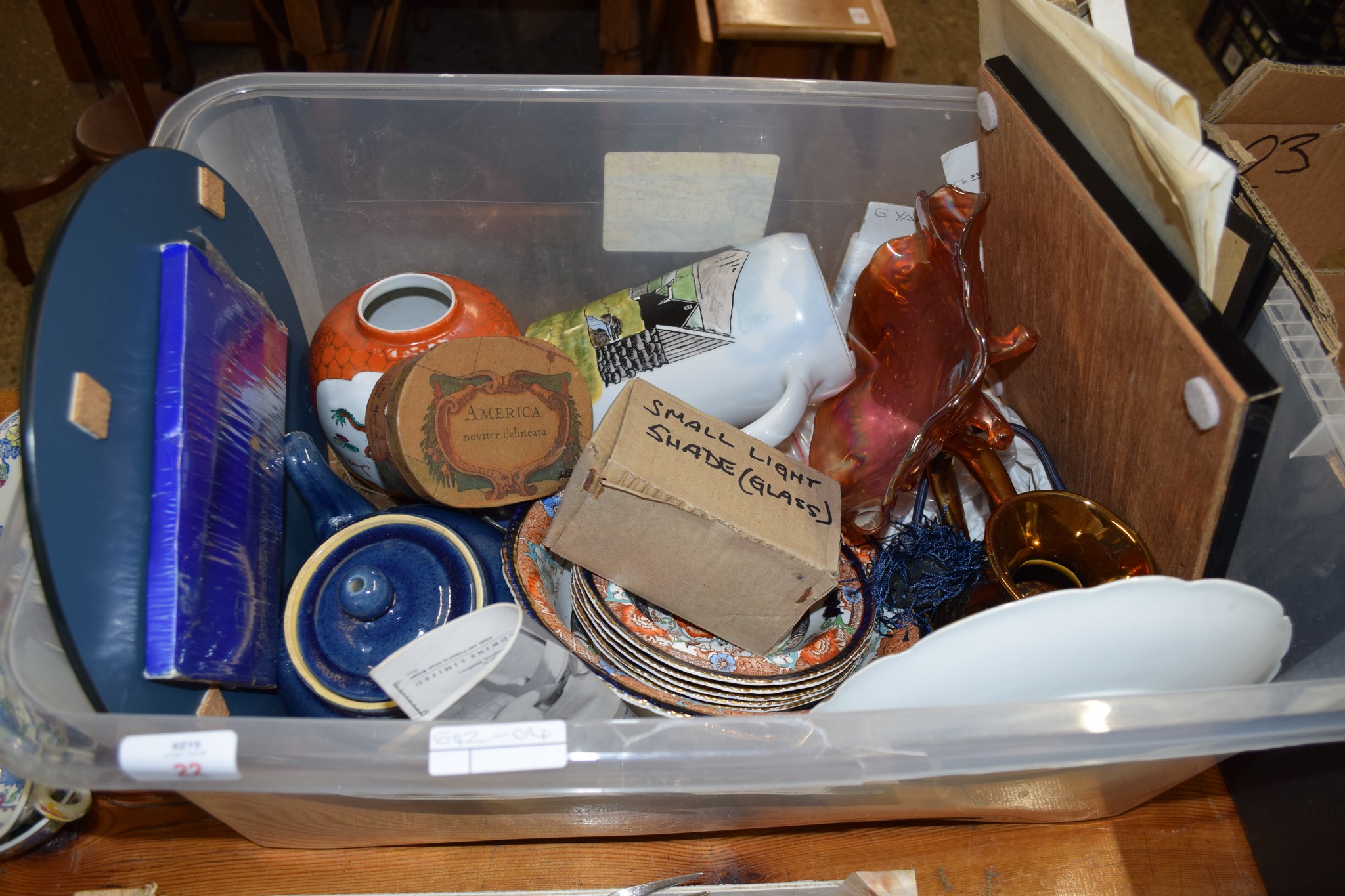 PLASTIC BOX CONTAINING CERAMICS AND DISHES INCLUDING A CARNIVAL GLASS DISH ON FOUR FEET