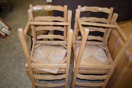 SET OF FOUR PINE SLAT BACK KITCHEN CHAIRS WITH RUSH SEATS