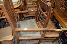 EARLY 20TH CENTURY OAK CARVER CHAIR AND FURTHER RUSH SEATED CARVER CHAIR