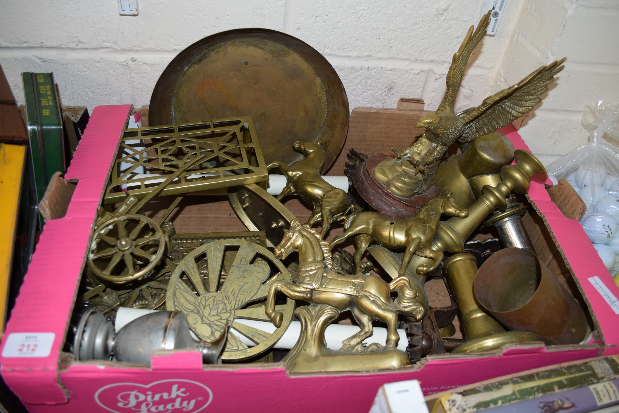 BOX CONTAINING BRASS WARES INCLUDING MODELS OF HORSES AND AN EAGLE AND SOME OLD BRASS SHELL CASES