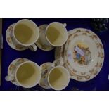 ROYAL DOULTON BUNNIKINS WARES INCLUDING FOUR MUGS AND STANDS AND QUANTITY OF SIDE PLATES