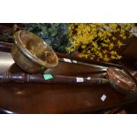 COPPER WARMING PAN AND BRASS LADLE WITH CAST METAL HANDLE, 86CM AND 96CM RESPECTIVELY