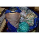 BAG CONTAINING VARIOUS BALLS OF YARN