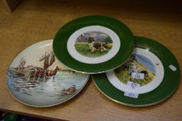 THREE CERAMIC PLATES FEATURING DOGS