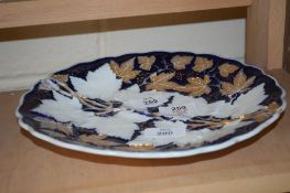 MEISSEN STYLE PLATE, THE BLUE GROUND DECORATED WITH GILT FLOWERS