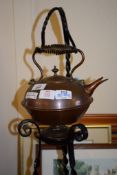 KETTLE ON WROUGHT IRON STAND