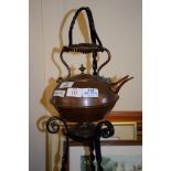 KETTLE ON WROUGHT IRON STAND