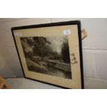 TWO PRINTS OF RIVER SCENES IN BLACK WOODEN FRAMES