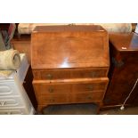 MAHOGANY FALL FRONT REPRODUCTION BUREAU RAISED ON BALL AND CLAW FEET WITH FITTED INTERIOR, WIDTH