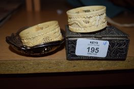 TWO SILVER PLATED DISHES AND TWO CARVED IVORY NAPKIN RINGS