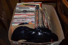 BOX CONTAINING VARIOUS SINGLE VINYL RECORDS, MOST APPEAR TO BE 1980S/EARLY 90S WITH SOME 60S