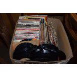 BOX CONTAINING VARIOUS SINGLE VINYL RECORDS, MOST APPEAR TO BE 1980S/EARLY 90S WITH SOME 60S