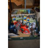 BOX CONTAINING VARIOUS MAGAZINES AND GAMES “REAL ROBOTS”