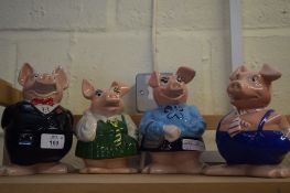 GROUP OF FOUR WADE PIG MONEY BOXES