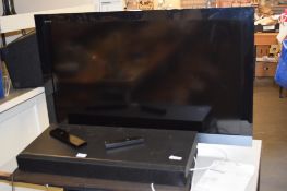 SONY BRAVIA 40” LCD FLAT SCREEN TV, TOGETHER WITH A SONY HOME THEATRE SOUND BAR