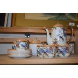 ORIENTAL PORCELAIN TEA SET WITH TEA BOWL AND FIVE CUPS AND SAUCERS
