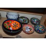 GROUP OF POTTERY DISHES