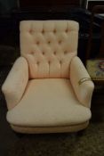 19TH CENTURY BUTTON BACK ARMCHAIR RAISED ON TURNED LEGS, WIDTH APPROX 80CM MAX