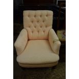 19TH CENTURY BUTTON BACK ARMCHAIR RAISED ON TURNED LEGS, WIDTH APPROX 80CM MAX