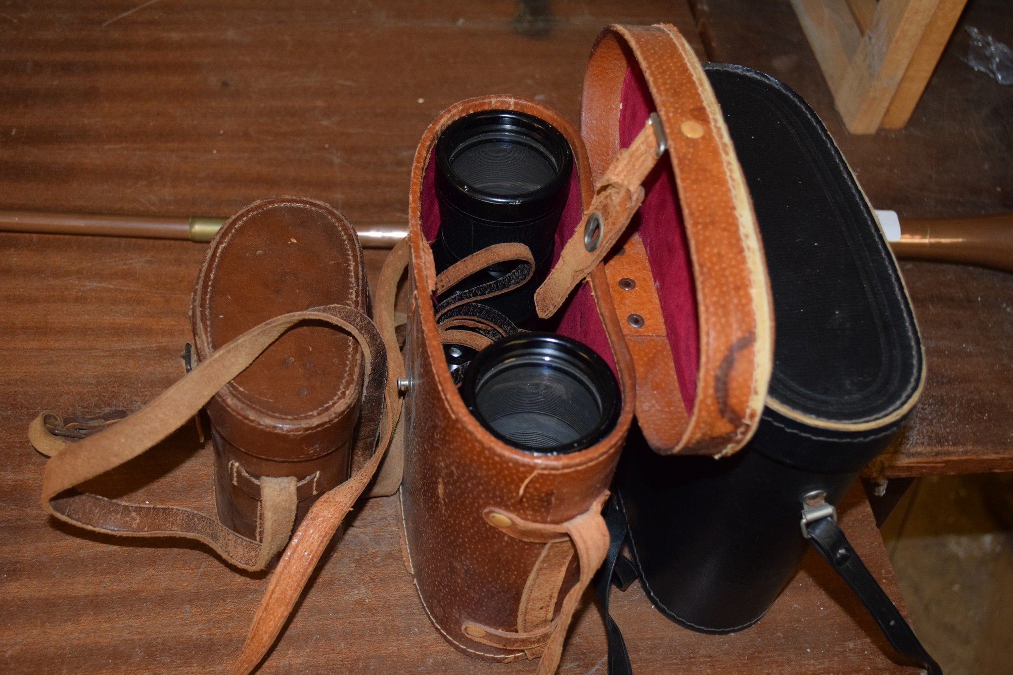 GROUP OF THREE CAMERAS IN ORIGINAL LEATHER CASES