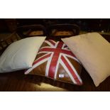 THREE VARIOUS CUSHIONS