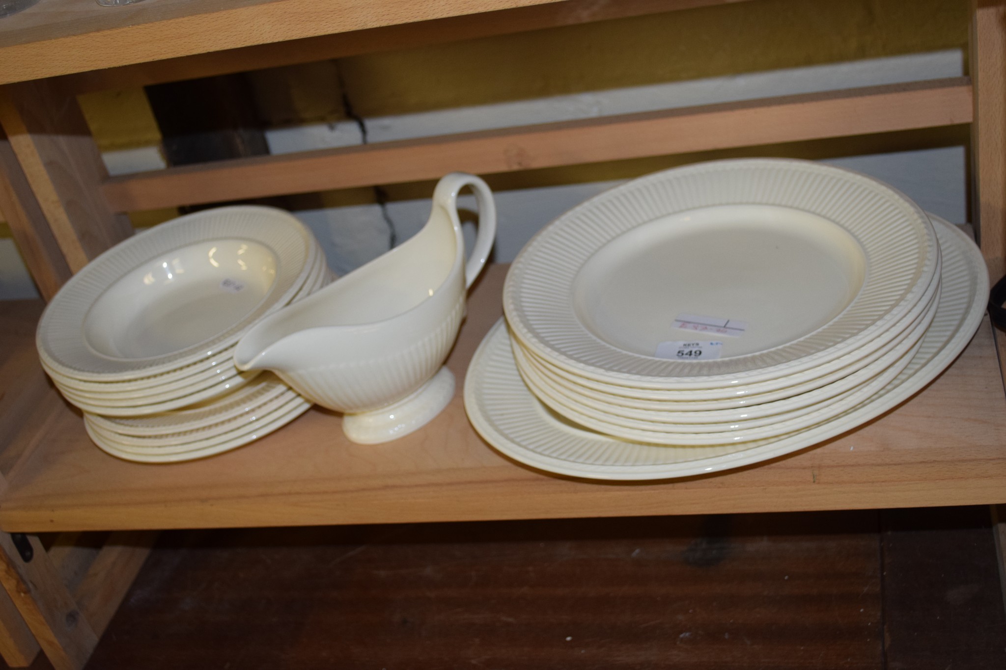 GROUP OF WEDGWOOD CREAMWARE DINNER WARES INCLUDING PLATES, SERVING DISH AND SOME DESSERT BOWLS