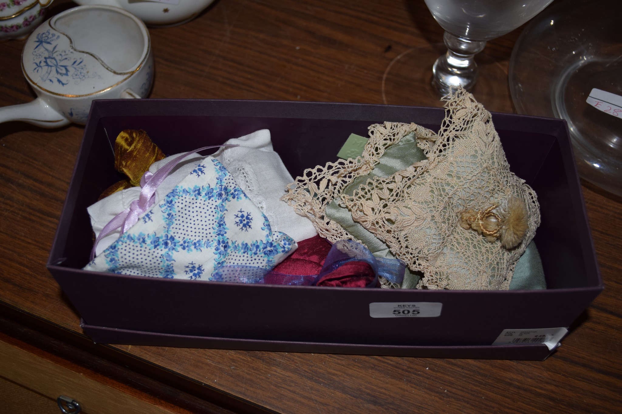 BOX CONTAINING SMALL MINIATURE CUSHIONS