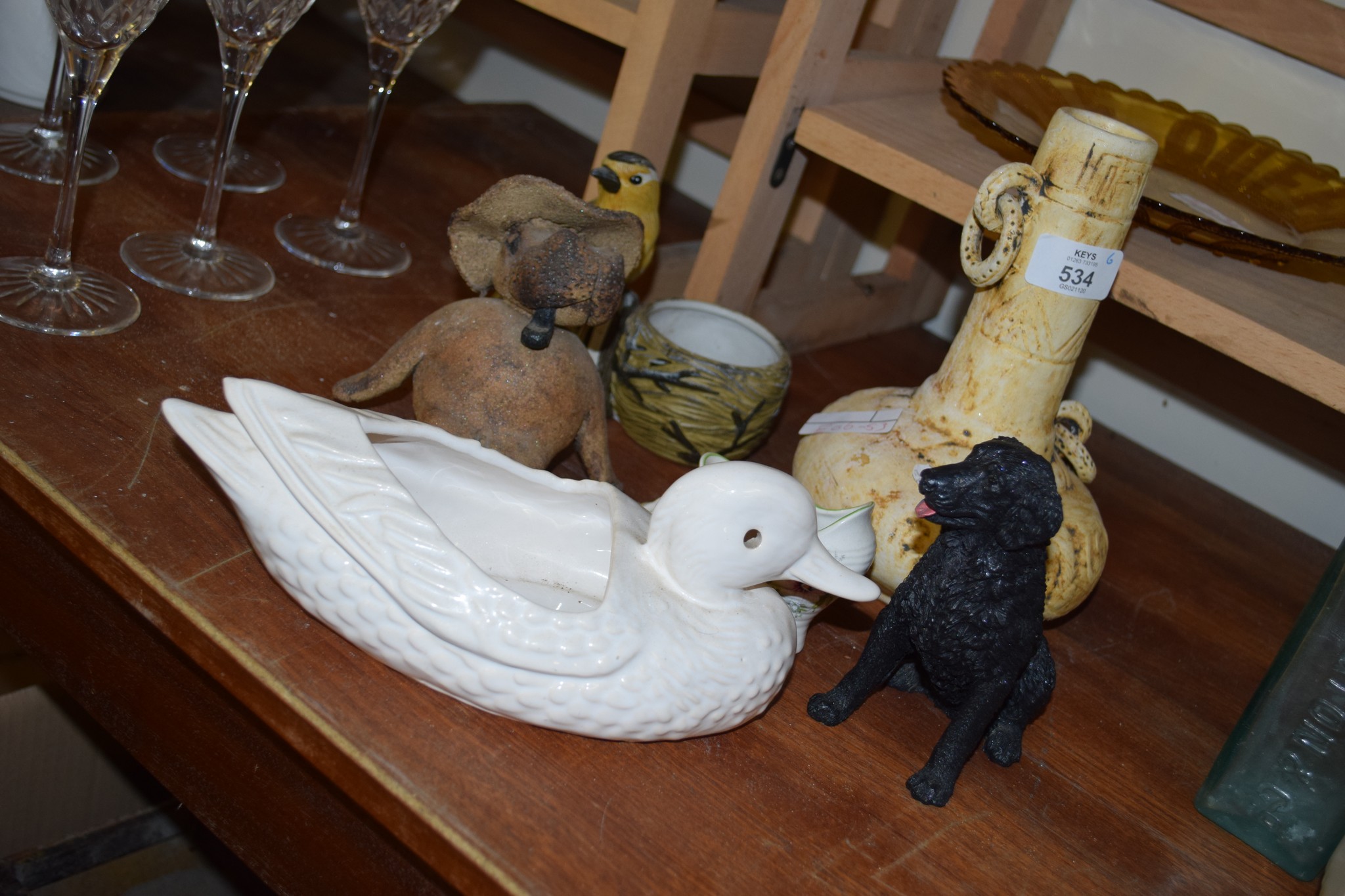 GROUP OF POTTERY ITEMS INCLUDING VASE, MODEL OF A DOG AND A BIRD