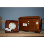 LIGHT WOOD CADDY WITH IVORY ESCUTCHEON AND A TRAVELLING ALARM CLOCK