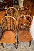 SET OF FOUR WHEEL BACK DINING CHAIRS, HEIGHT APPROX 81CM