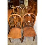 SET OF FOUR WHEEL BACK DINING CHAIRS, HEIGHT APPROX 81CM