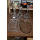 COLLECTION OF CUT GLASS DECANTERS AND STOPPERS