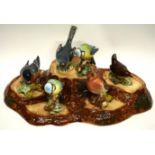 Group of Beswick ware birds mounted on a naturalistic wooden base (6)