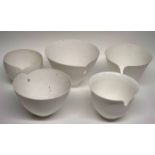 Interesting group of studio pottery bowls modelled in white with a pierced design, the base