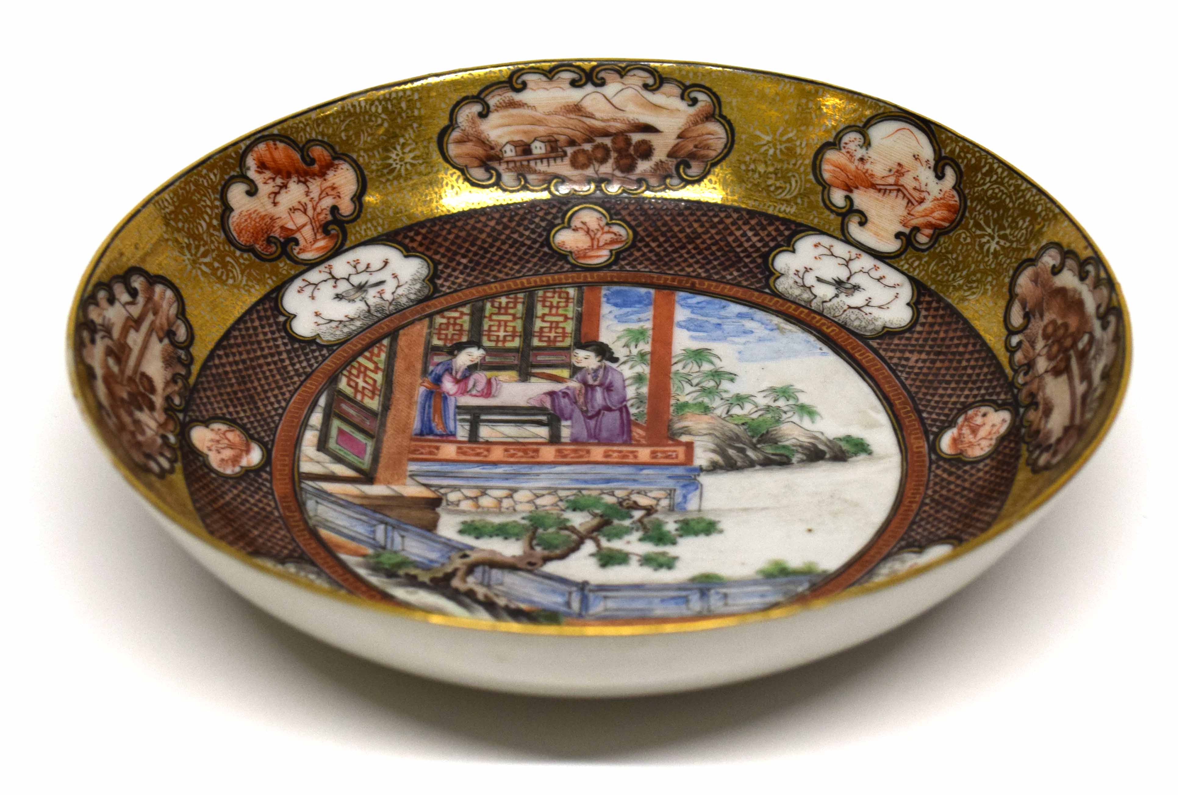 18th century Qianlong period saucer, decorated in polychrome with a Chinese family scene to the