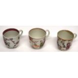 Group of three 18th century Lowestoft porcelain coffee cups with polychrome decoration, two