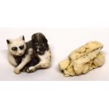 Two finely carved netsuke, one of a cat with a rat on its back