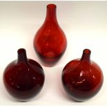 Group of three red coloured Swedish vases of bottle shape (3)