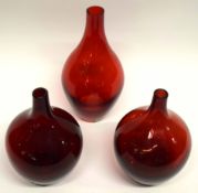 Group of three red coloured Swedish vases of bottle shape (3)