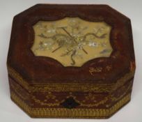 Leather bound jewellery box with needlework of flowers and rake to the centre