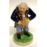 19th century Derby figure of a prosperous gentleman, height 11cm (crack to base)